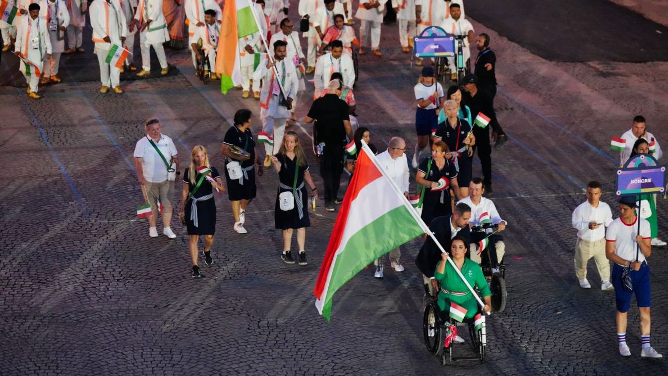 Hungary's delegation parades on the Champs-Elysees avenue during the Paris 2024 Paralympic Games Opening Ceremony in Paris on August 28, 2024.