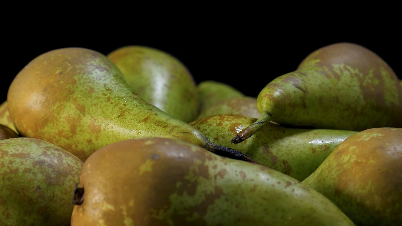 A,Close-up,Of,A,Group,Of,Green,Pears.,The,Pears