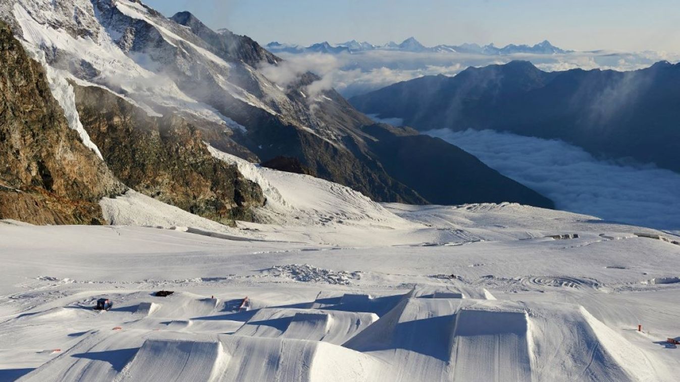 Snow landscape at bottom of mountain range, Saas-Fee, Valais, Switzerland.