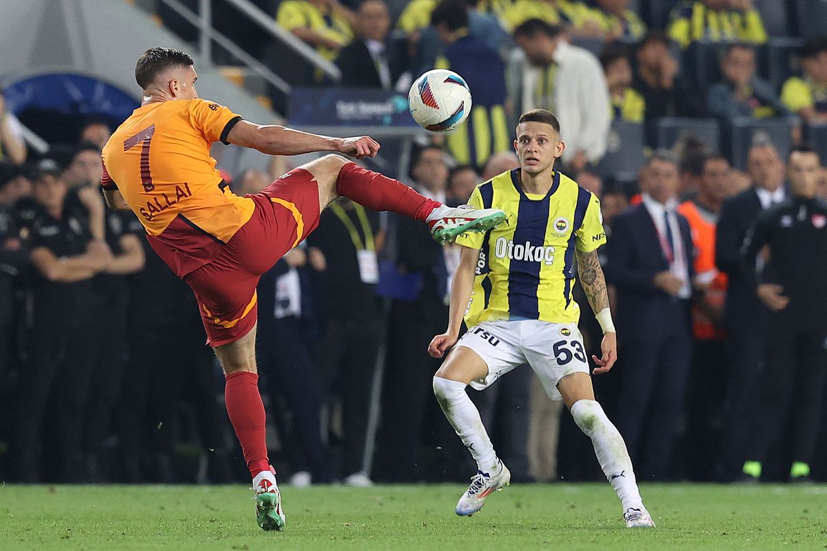 Fenerbahce v Galatasaray - Turkish Super LigISTANBUL, TURKIYE - SEPTEMBER 21: Sebastian Szymanski (53) of Fenerbahce in action against Roland Sallai (7) of Galatasaray during the Turkish Super Lig 6th week match between Fenerbahce and Galatasaray at Ulker Stadium in Istanbul, Turkiye on September 21, 2024. Ahmet Okatali / Anadolu 