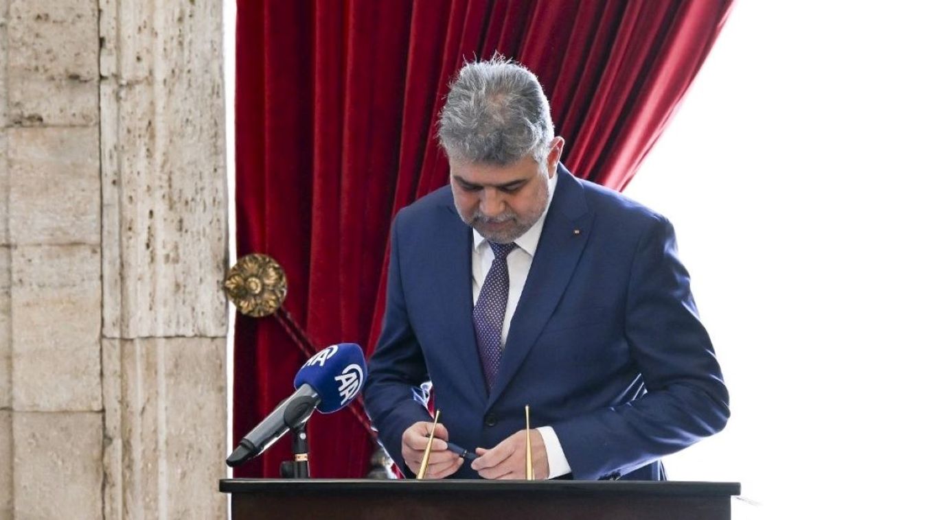 Romanian Prime Minister Marcel Ciolacu signs Anitkabir's special guest book at Anitkabir, the mausoleum of Turkish Republic's Founder Mustafa Kemal Ataturk, during his official visit in Ankara, Turkiye on May 21, 2024.