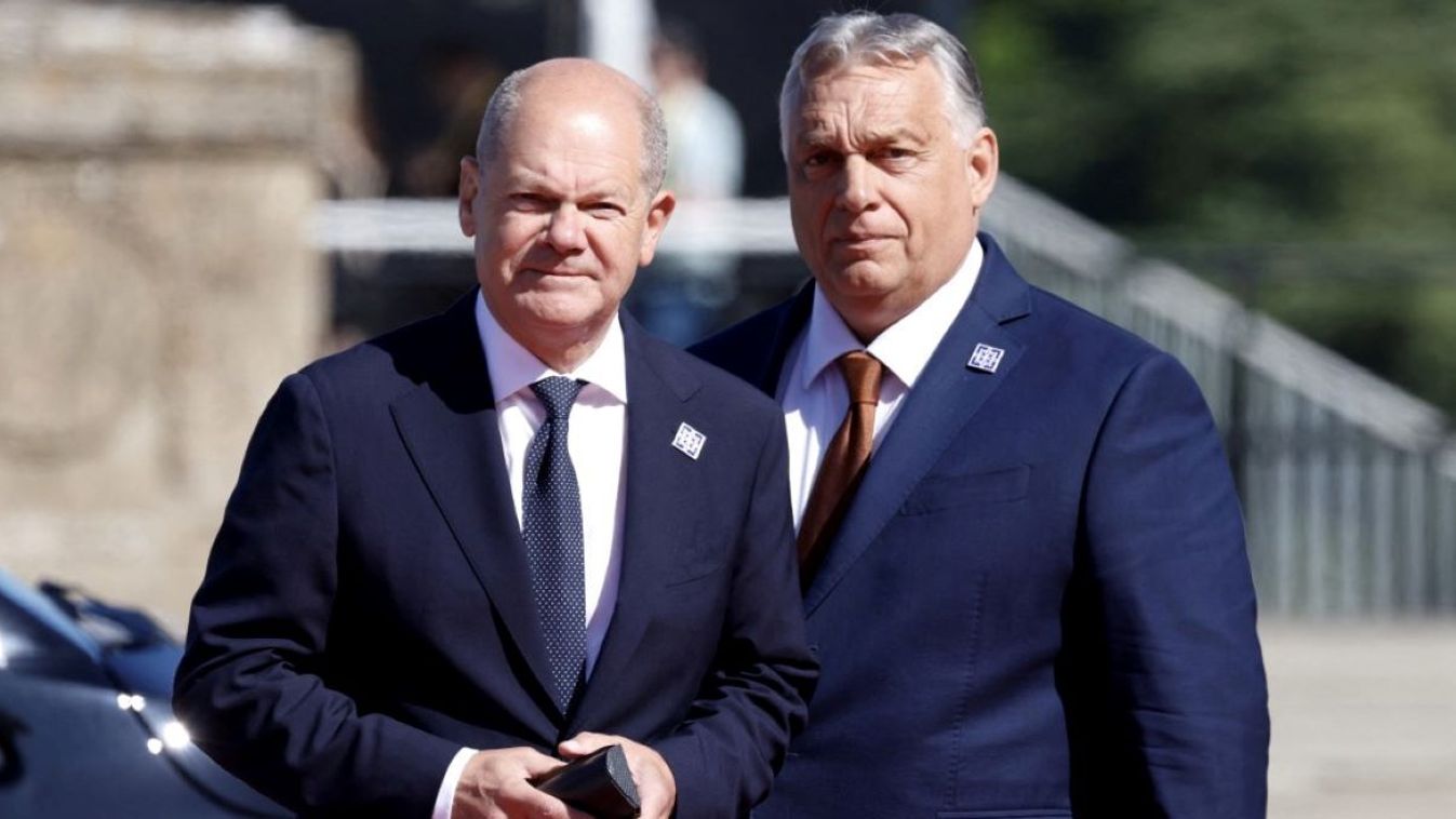 Germany's Chancellor Olaf Scholz (L) and Hungary's Prime Minister Viktor Orban arrive for the Meeting of the European Political Community at the Blenheim Palace in Woodstock, near Oxford, on July 18, 2024.