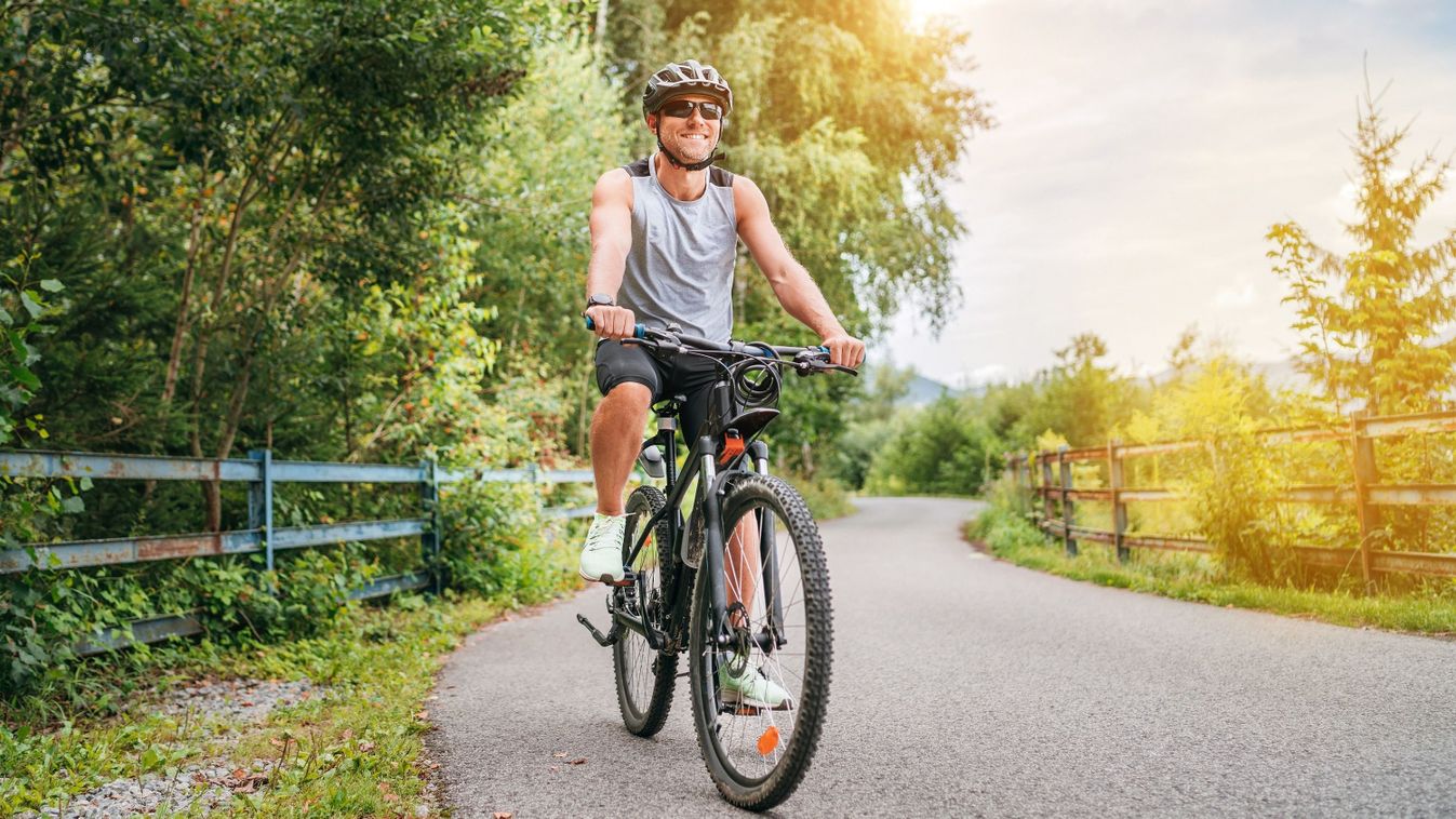 Portrait,Of,A,Happy,Smiling,Man,Dressed,In,Cycling,Clothes,