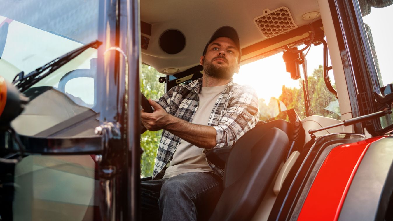 Caucasian,Ethnicity,Man,Driving,Farm,Or,Construction,Tractor.