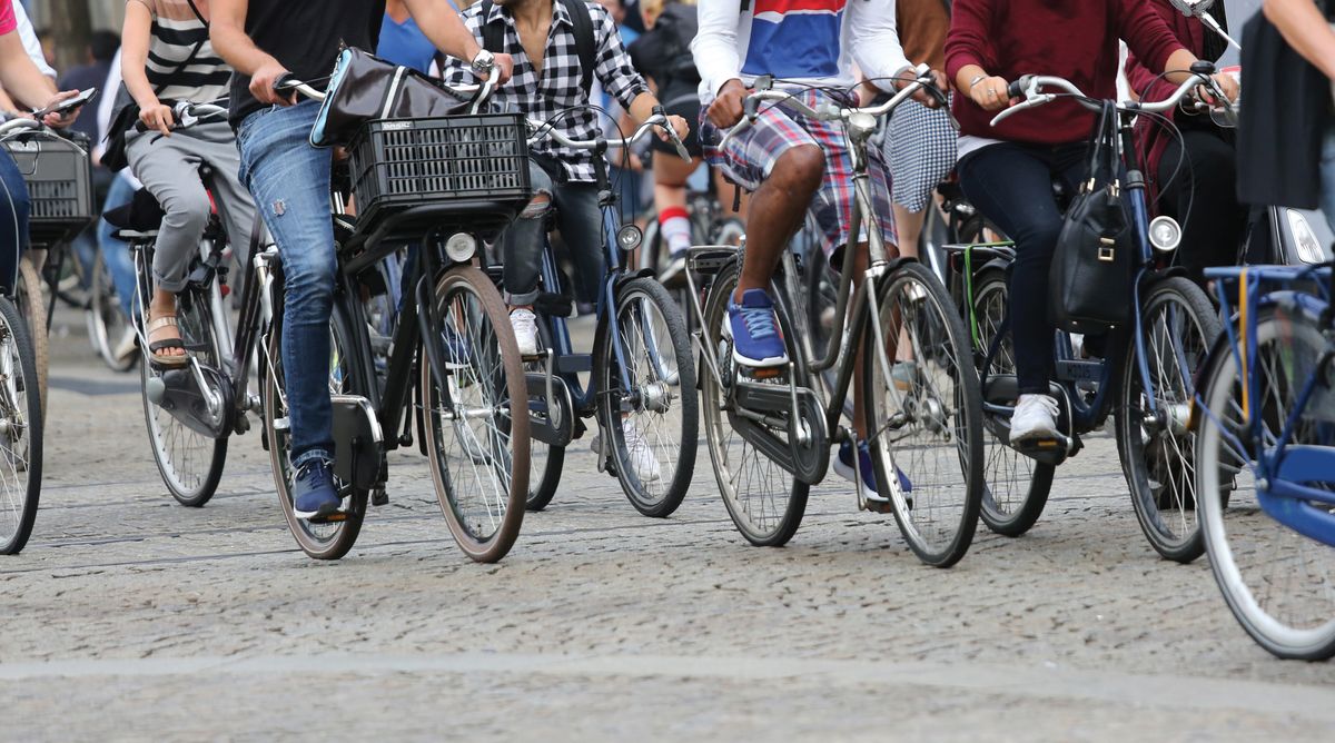 Many,People,Fast,Riding,Bicycles,In,Amsterdam,In,The,Netherlands