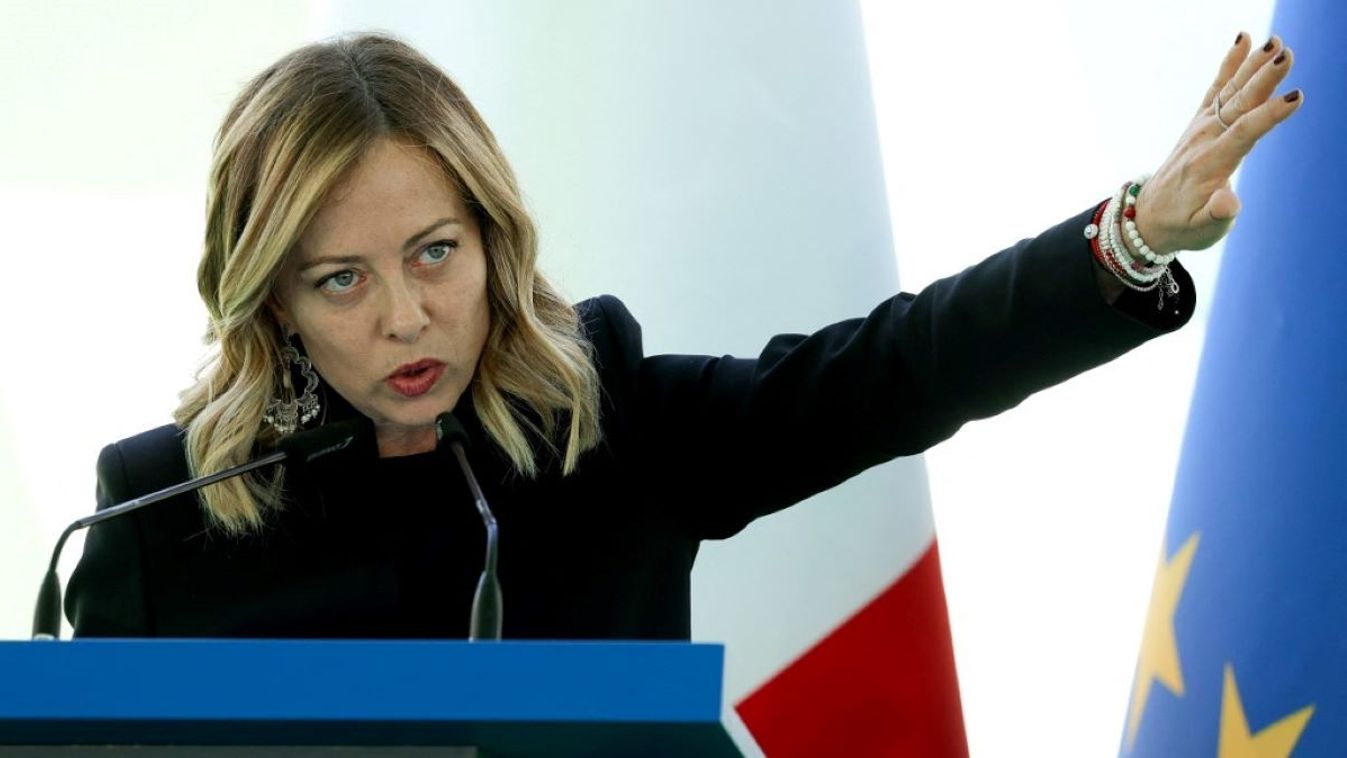 Italy's Prime Minister Giorgia Meloni gestures as she delivers a press conference with Albania's Prime Minister as part of her visit at the site of a recently build Italian-run migrant centre at the port of Shengjin, some 60 kms northwest of Tirana, on June 5, 2024.