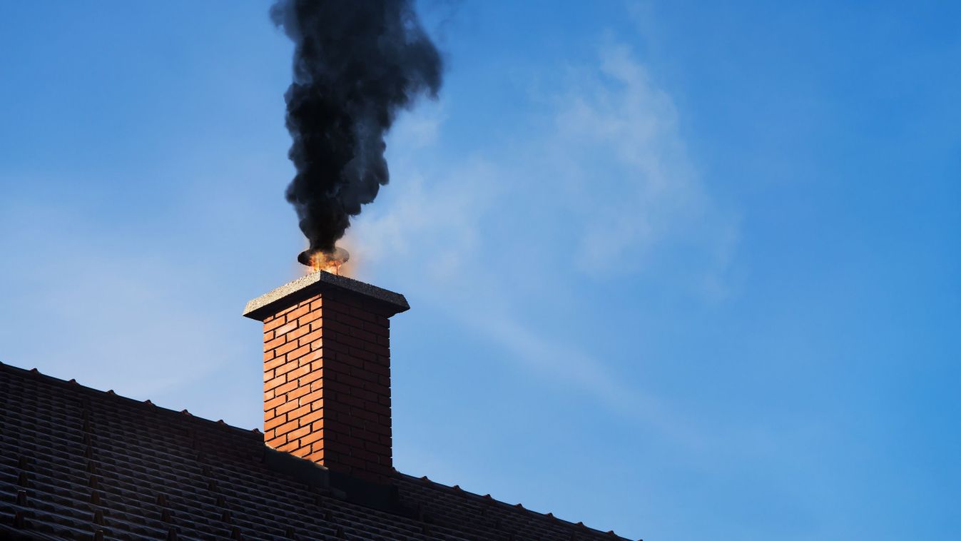 Chimney,On,Fire,With,A,Black,Smoke,Coming,Out.