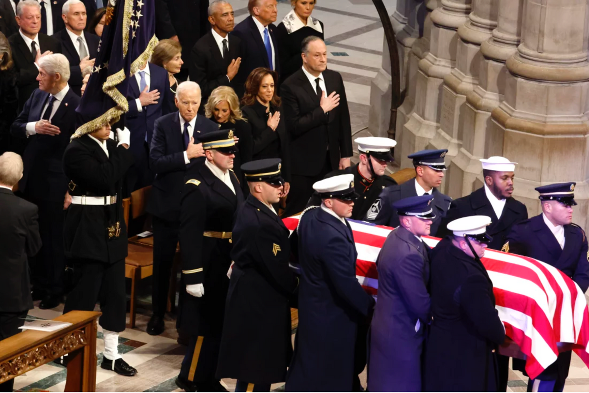 U.S. military carry the flag-draped casket bearing the remains of former President Jimmy Carter into the Washington National Cathedral for the state funeral on Thursday in Washington, D.C. President Joe Biden declared today a national day of mourning for Carter who died at the age of 100 on Dec. 29, 2024. Chip Somodevilla/Getty Images