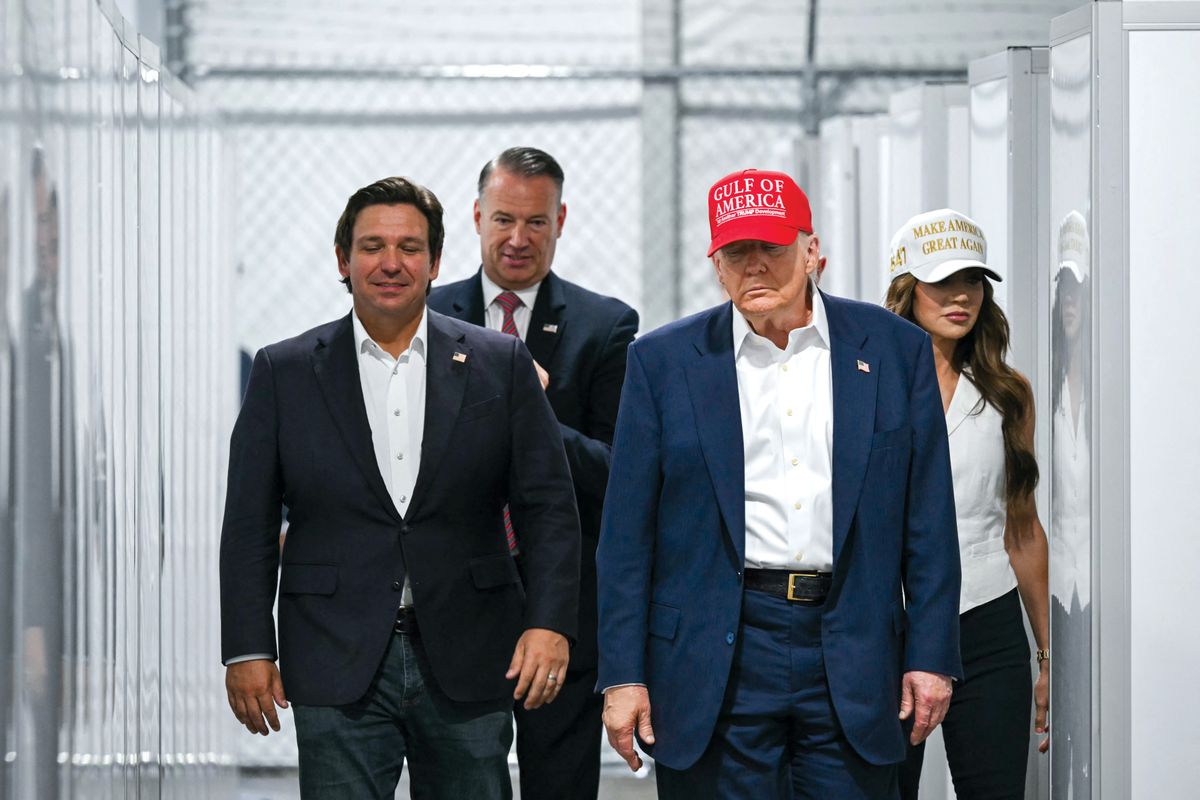 US President President Donald Trump visits a detention center located in the Florida Everglades